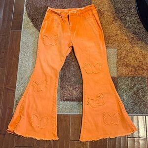 Orange Flared Women Jeans with Butterfly Design